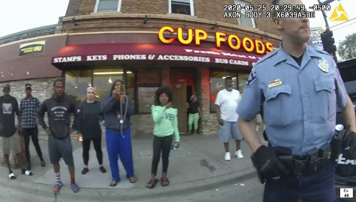 In this image from police body camera video former Minneapolis police Officer Derek Chauvin sta ...