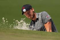 Danny Willett, of England, hits from the bunker on the seventh hole during a practice round for ...