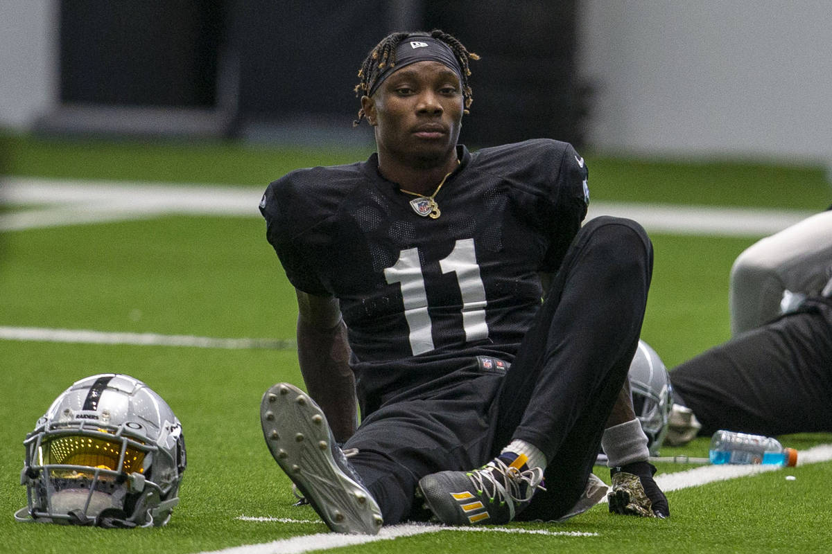 Las Vegas Raiders wide receiver Henry Ruggs III (11) stretches during a practice session at the ...