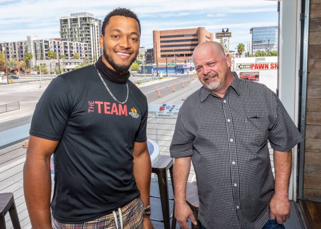 NFL quarterback Brett Hundley, left, and Las Vegas' TV reality star and pawn shop owner Rick Ha ...