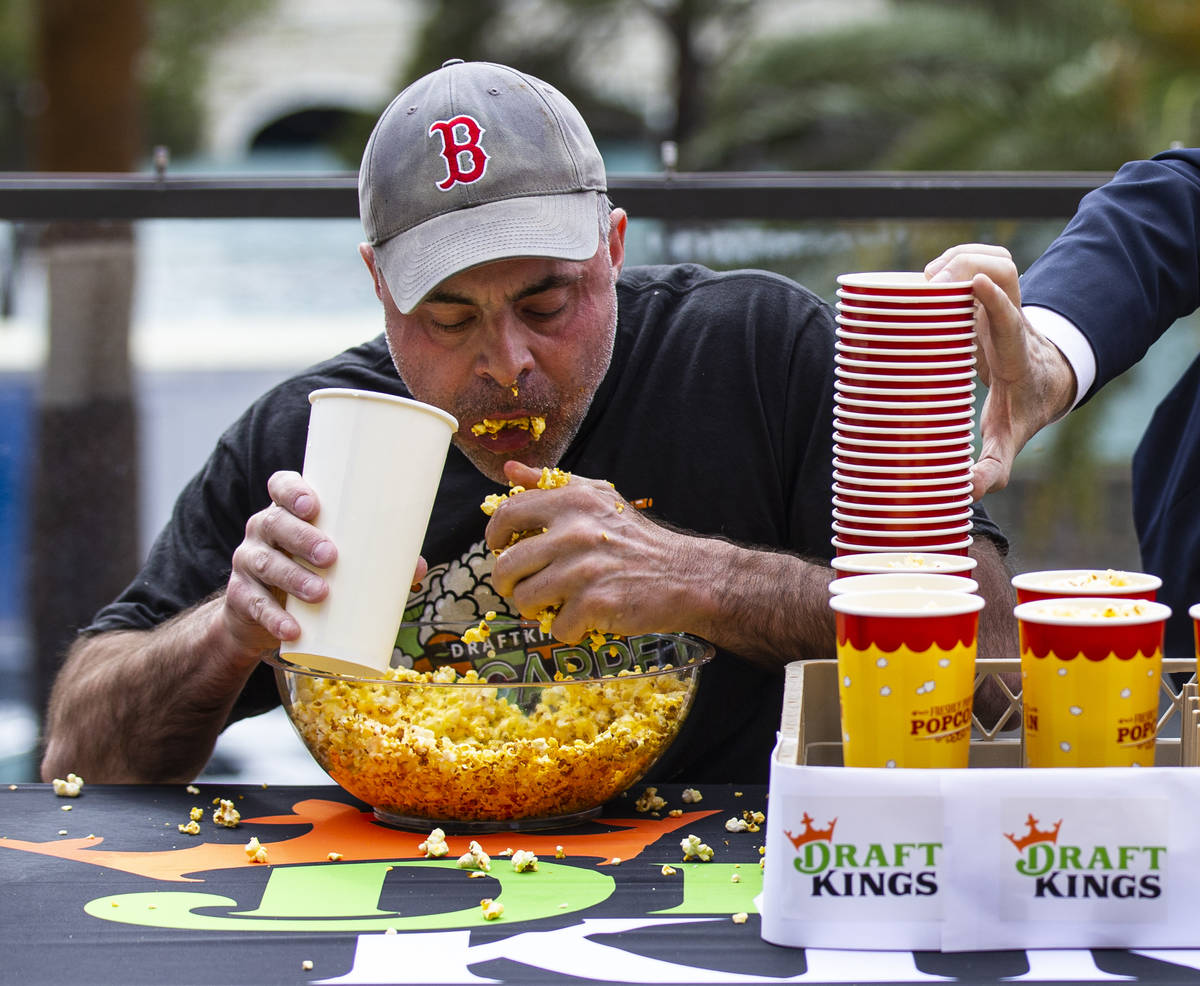 Geoff Esper competes in the World Popcorn Eating Championship during the "Red Carpet Film ...