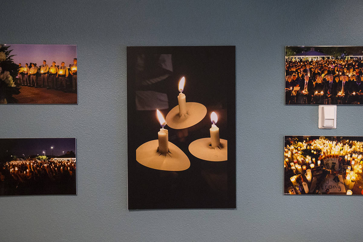 Photos of vigils and memorials following the October 1 shooting on display at the Vegas Strong ...