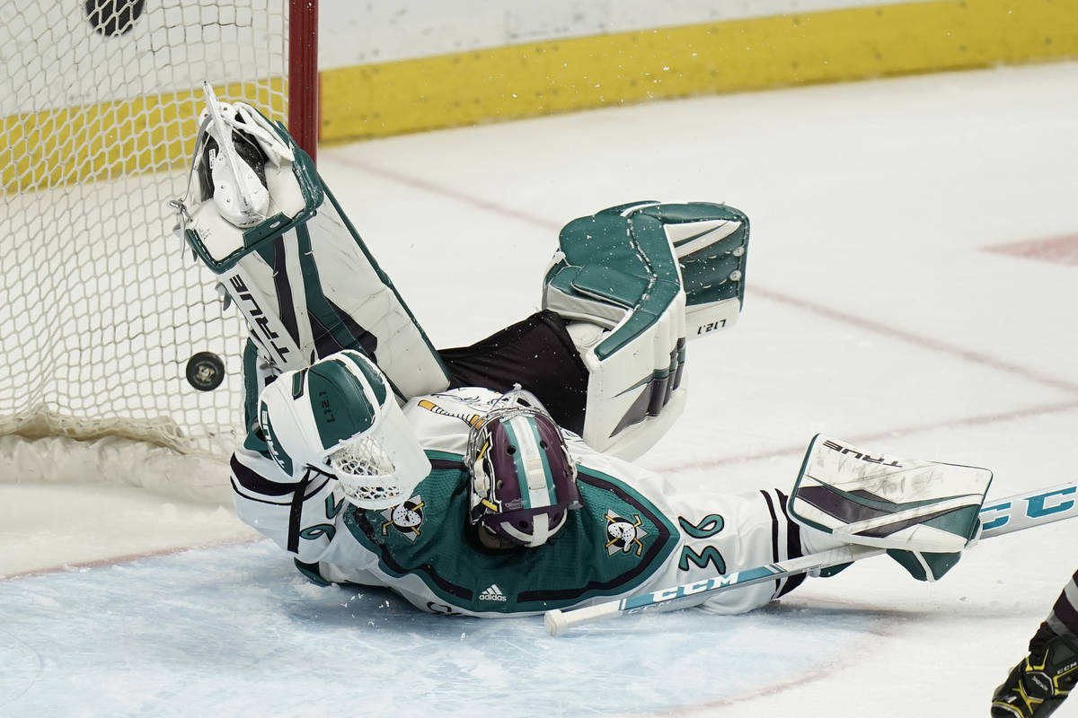 Anaheim Ducks goaltender John Gibson tumbles after making a save against the Vegas Golden Knigh ...