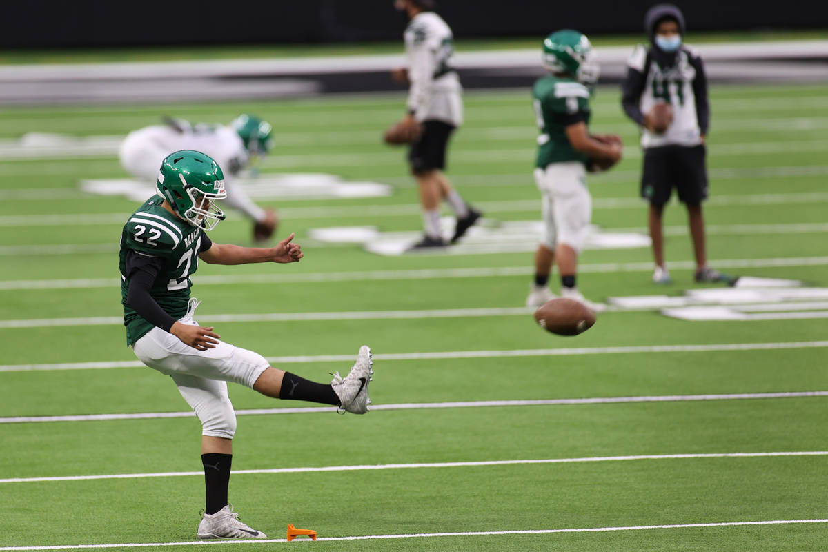 Rancho's Chris Aviles (22) works on his kicks during a team football practice at Allegiant Stad ...