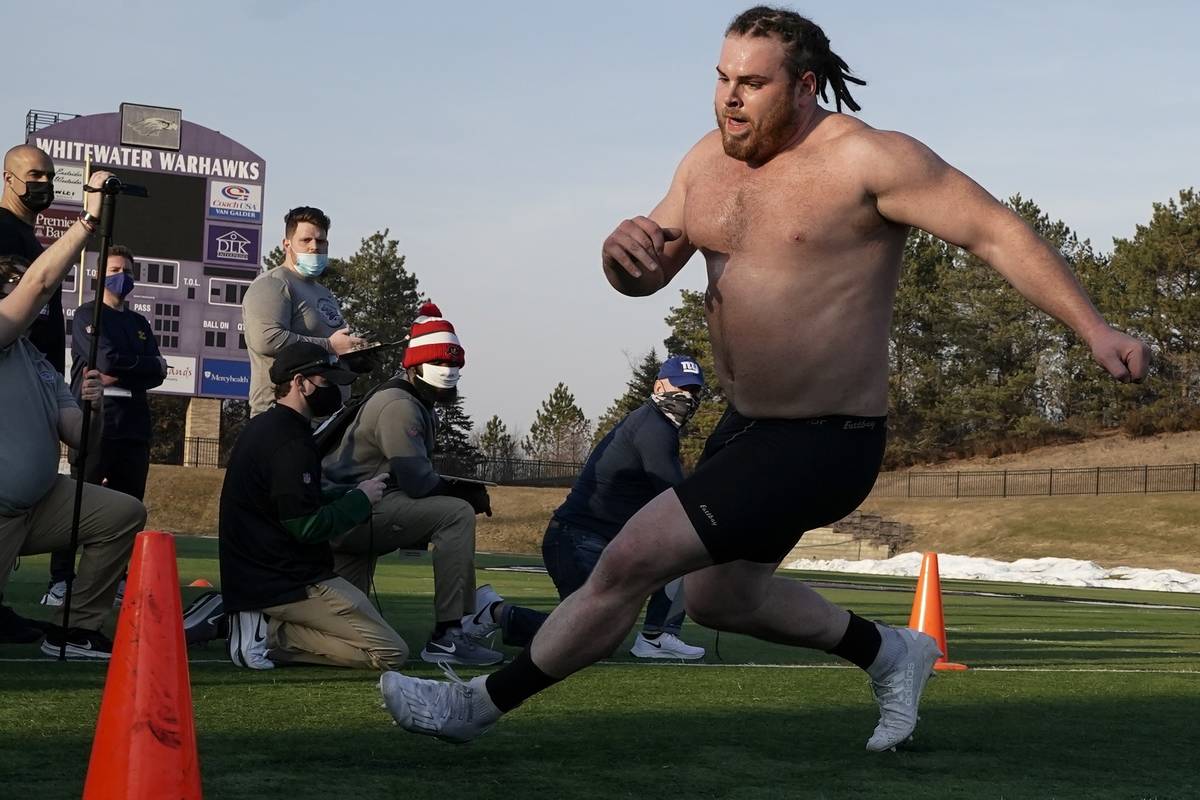 UW Whitewater lineman Quinn Meinerz runs at the school's pro football day Tuesday, March 9, 202 ...