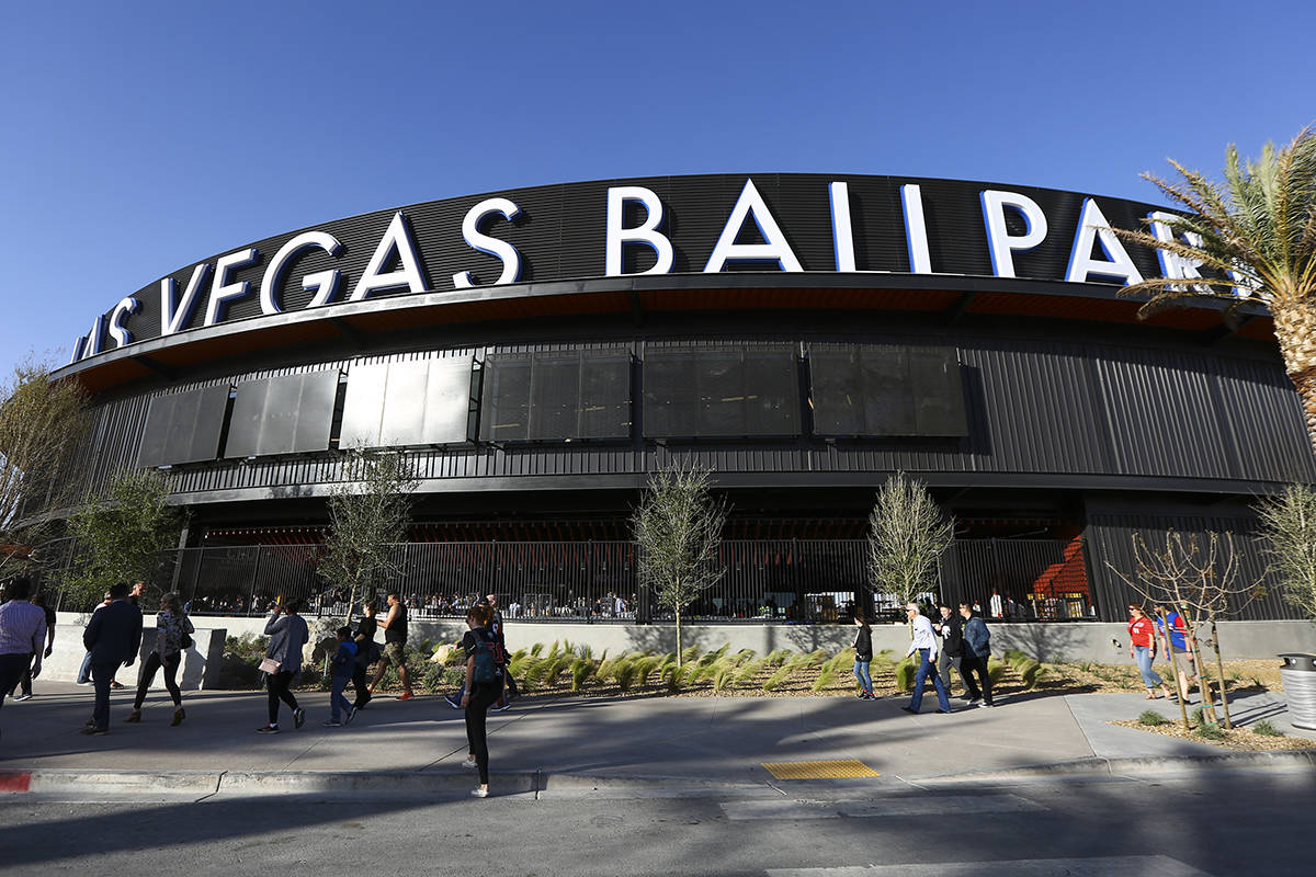 Fans line up to enter the Las Vegas Ballpark for the Las Vegas Aviators' home opener in Downtow ...