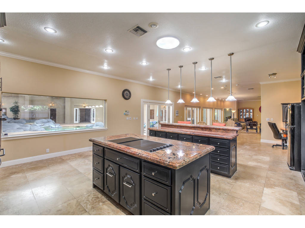 Islands in the kitchen of 2525 Driftwood Drive. (Brian Mannasmith/Neon Sun Photography)