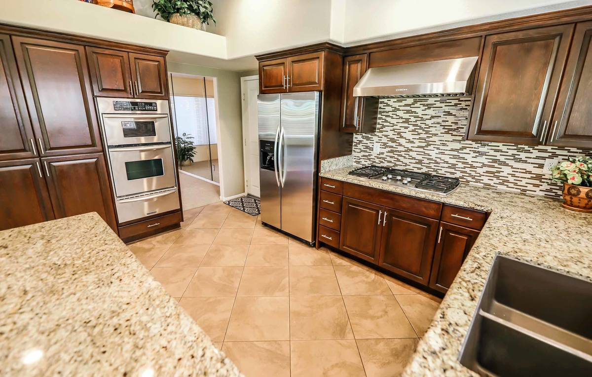 The kitchen of 8812 Saint Pierre Drive. (SugarMill Studios)