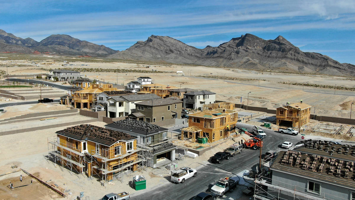 An aerial view of homes under construction in Cascades, a housing development near Far Hills Av ...