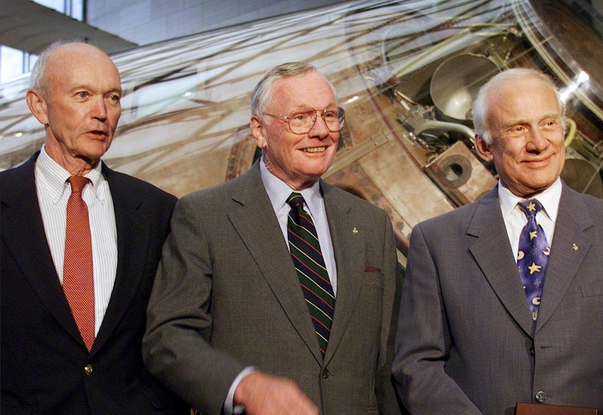 FILE - In this July 20, 1999 file photo, Apollo 11 astronauts, from left, Michael Collins, Neil ...