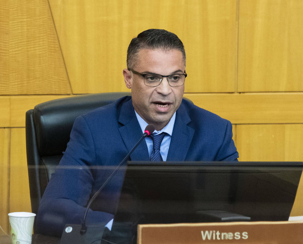 Metropolitan Police Department Detective Marc Colon takes the witness stand inside commission c ...