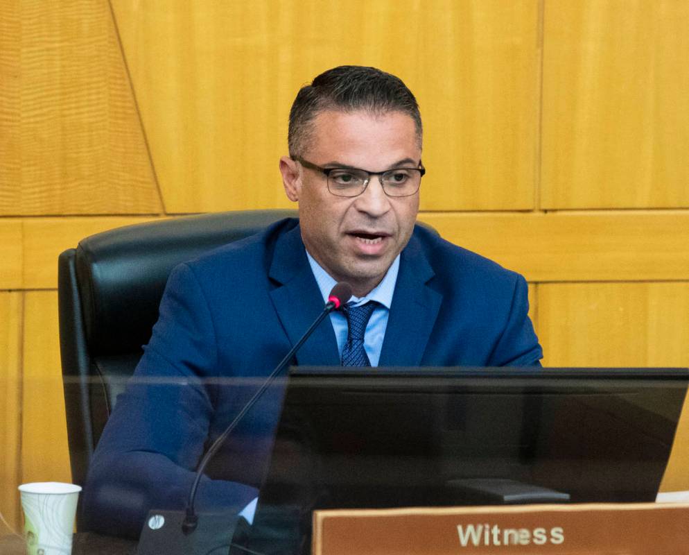 Metropolitan Police Department Detective Marc Colon takes the witness stand inside commission c ...