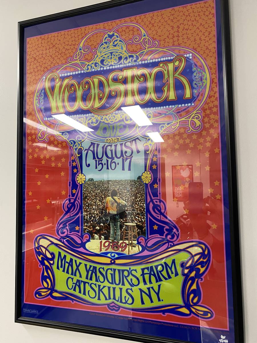 A Woodstock poster is shown at The 1960 bar at Allegiant Stadium on Thursday, April 29, 2021. ( ...