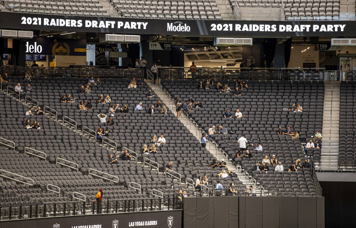 Fans are spread throughout the stands during the 2021 Las Vegas Raiders NFL Draft Party at Alle ...