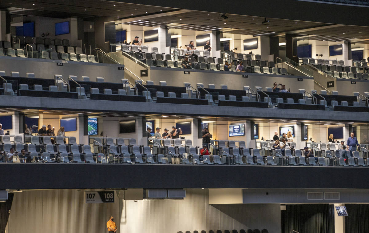 Fans look on from the boxes as the first pick is announced during the 2021 Las Vegas Raiders NF ...