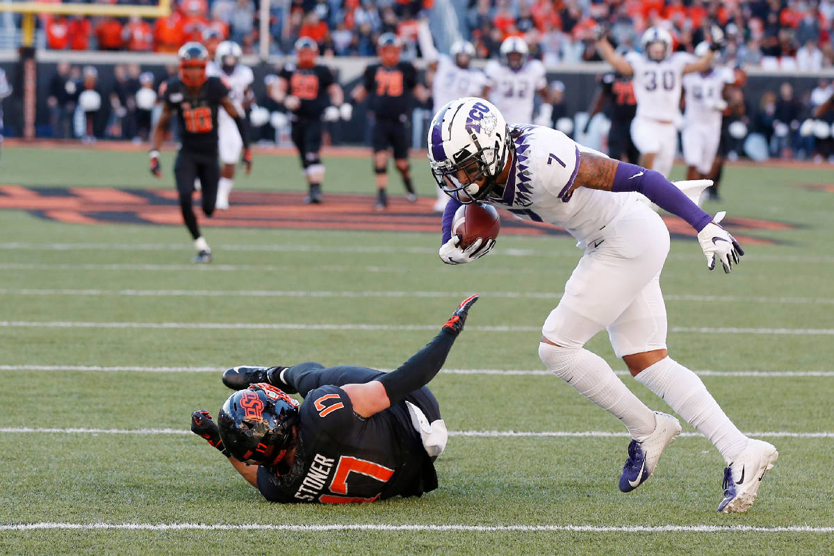 TCU safety Trevon Moehrig (7) comes down with the ball on an interception on a pass intended fo ...