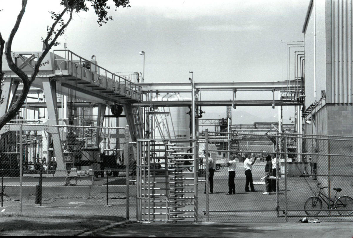 Fire Department officials enter the Pioneer facility, minutes after the all clear was given on ...