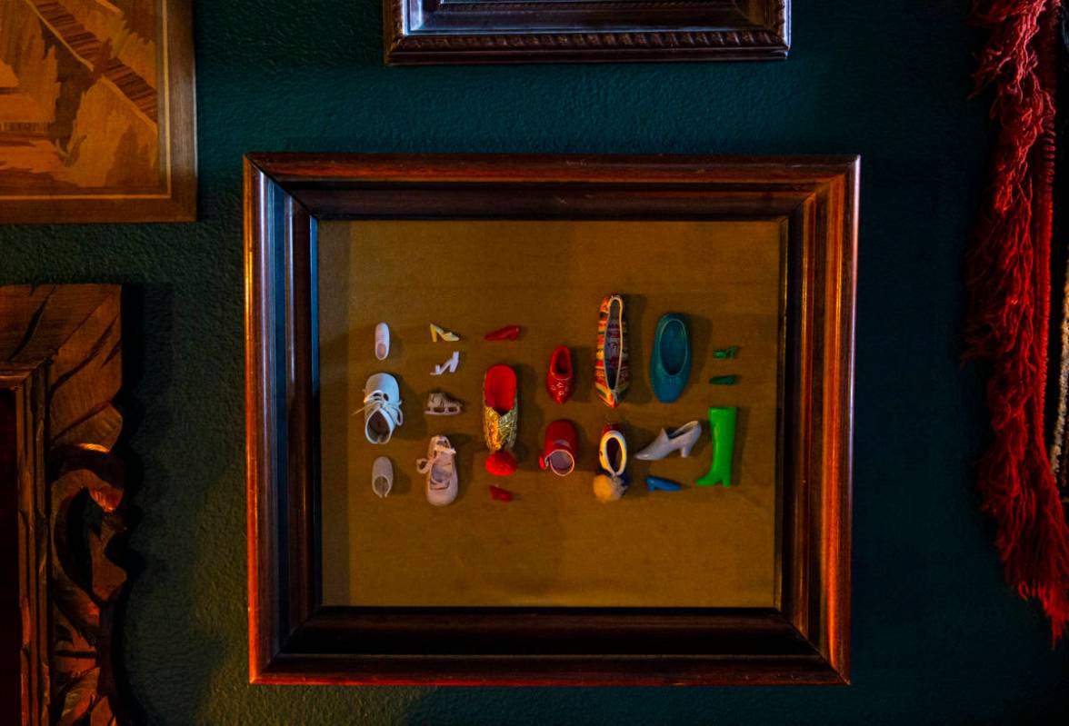 Collected miniature shoes are displayed at the Office of Collecting & Design, a museum and ...