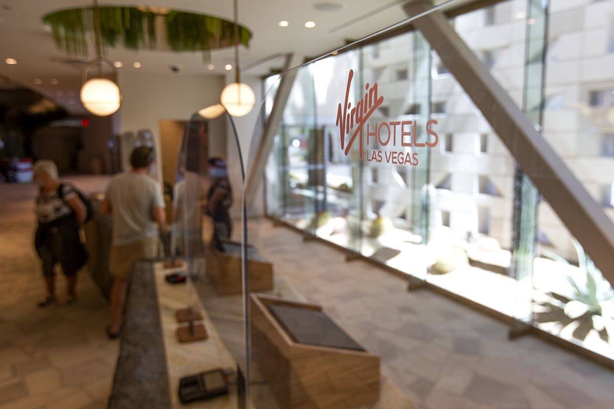 Guests check in at Virgin Hotels Las Vegas on Friday, April 30, 2021, in Las Vegas. (Ellen Schm ...