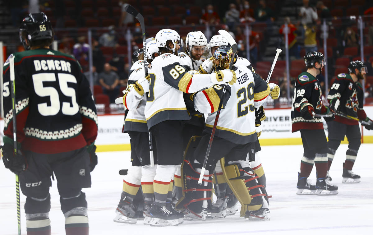 The Golden Knights celebrate with goaltender Marc-Andre Fleury (29) after an overtime win again ...