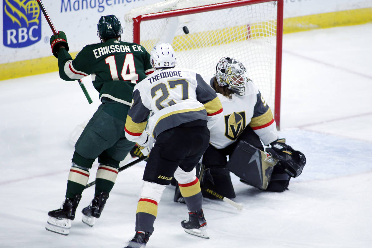 Minnesota Wild center Joel Eriksson Ek (14) scores a goal on Vegas Golden Knights goaltender Ro ...