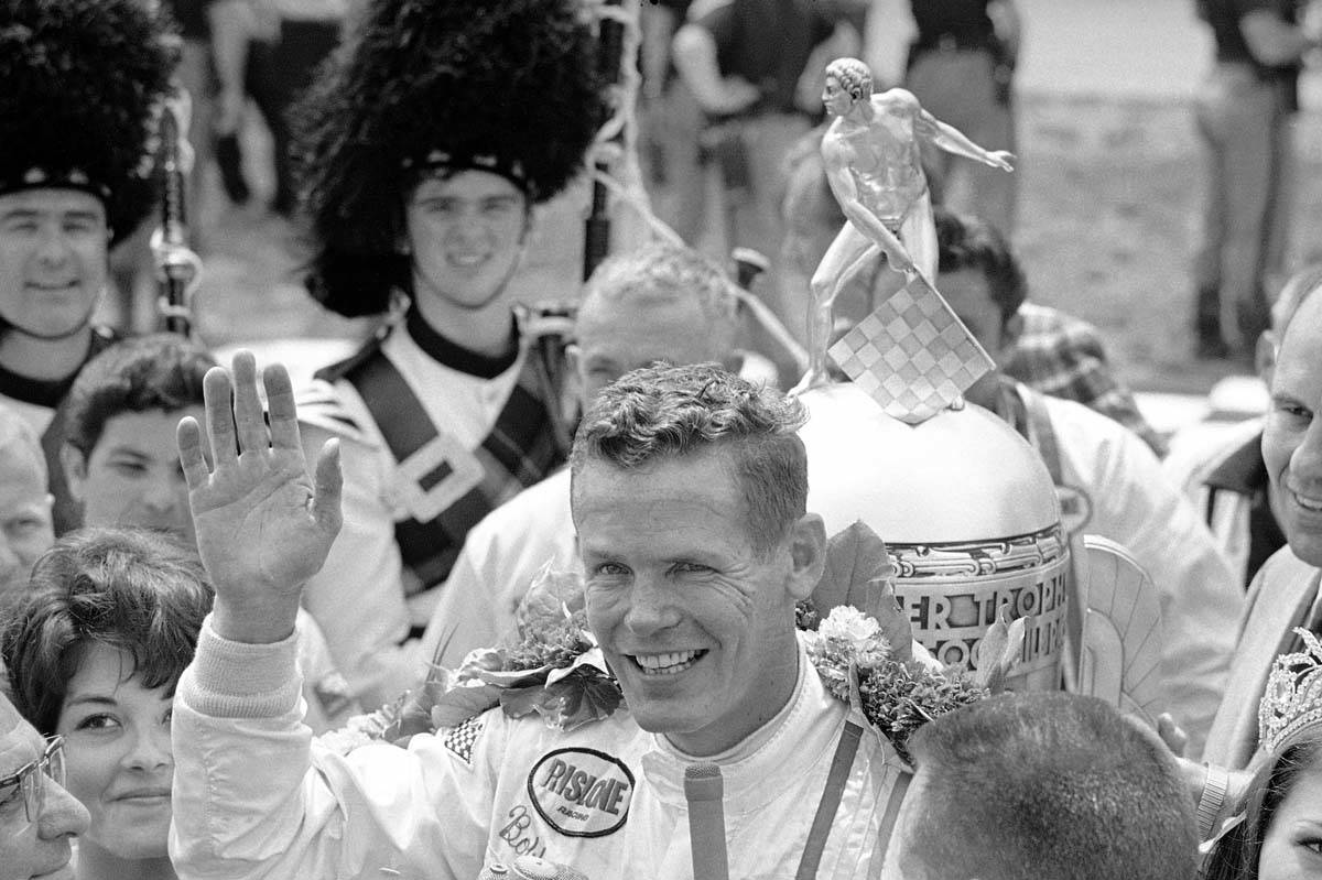 In this May 30, 1968, file photo, Bobby Unser celebrates winning the 52nd running of the Indian ...
