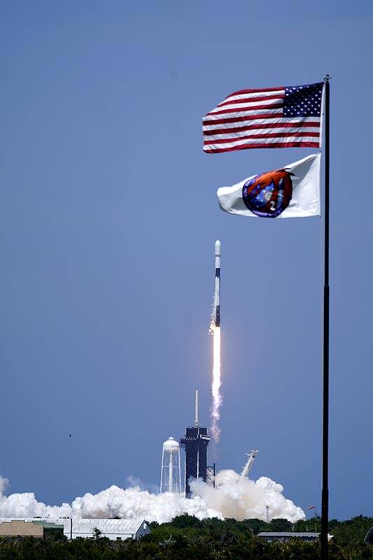 A SpaceX Falcon 9 rocket with the 26th batch of approximately 60 satellites for SpaceX's Starli ...