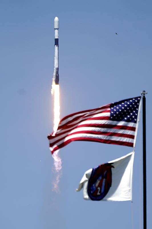 A SpaceX Falcon 9 rocket with the 26th batch of approximately 60 satellites for SpaceX's Starli ...