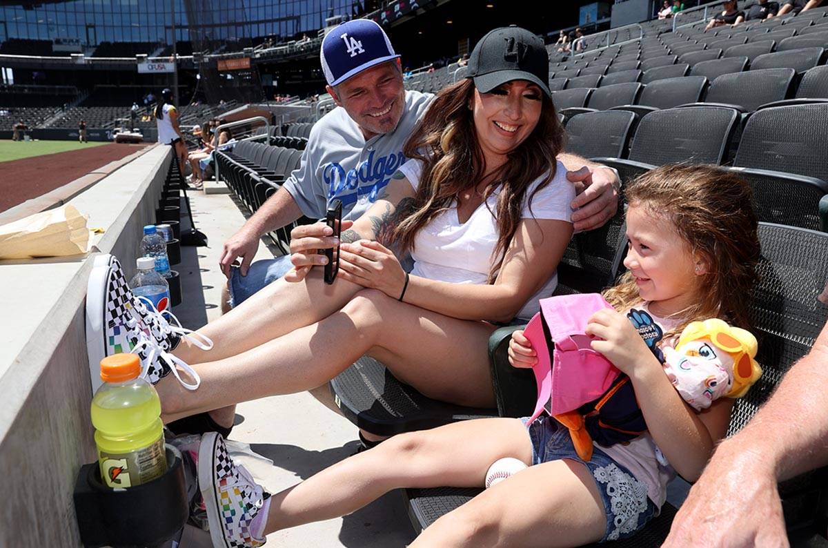 Kelsey Bentley plays with her daughter Kacey, 5, at Las Vegas Ballpark before the Aviators take ...