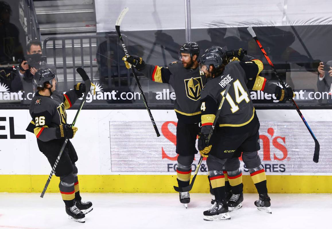 Golden Knights' Alex Pietrangelo, center, celebrates after his goal against Colorado Avalanche ...