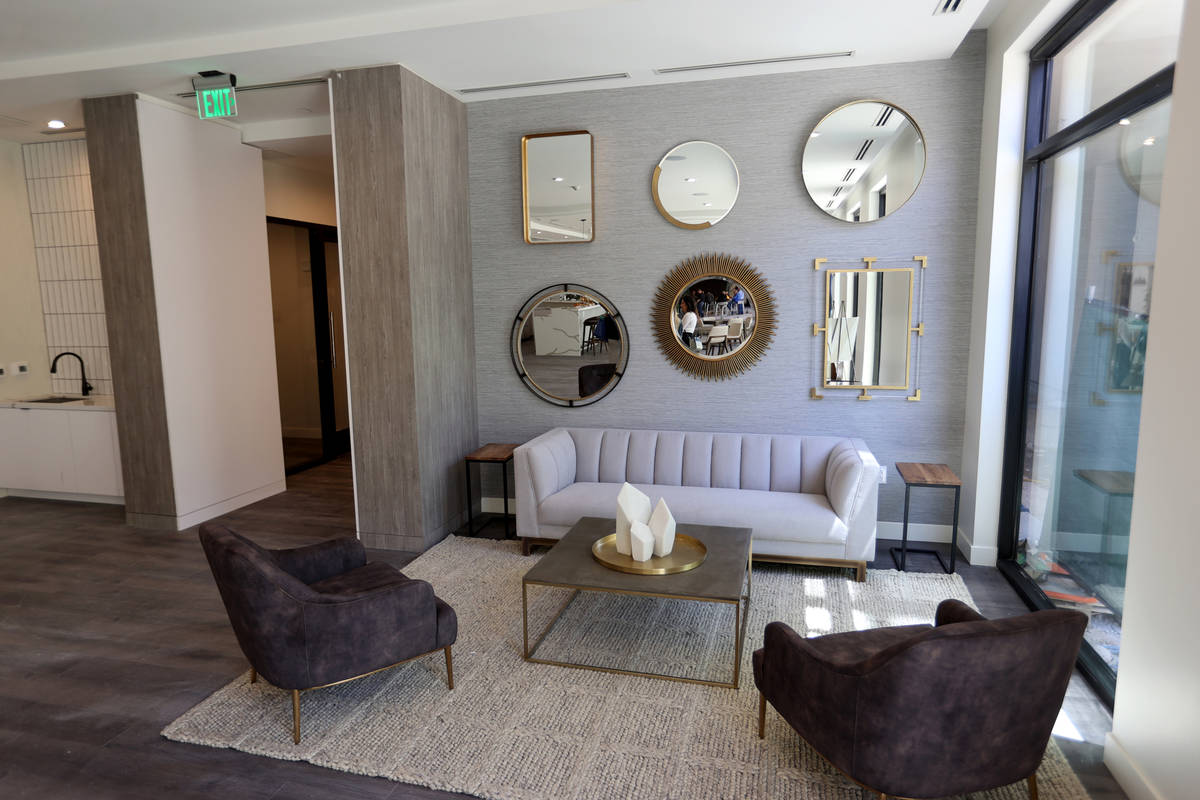 A sitting area in the resident lounge at Parc Haven apartment complex at Symphony Park in downt ...
