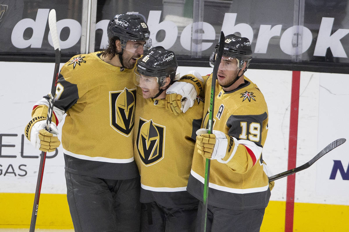 Golden Knights right wing Alex Tuch (89), left, center Jonathan Marchessault (81) and right win ...