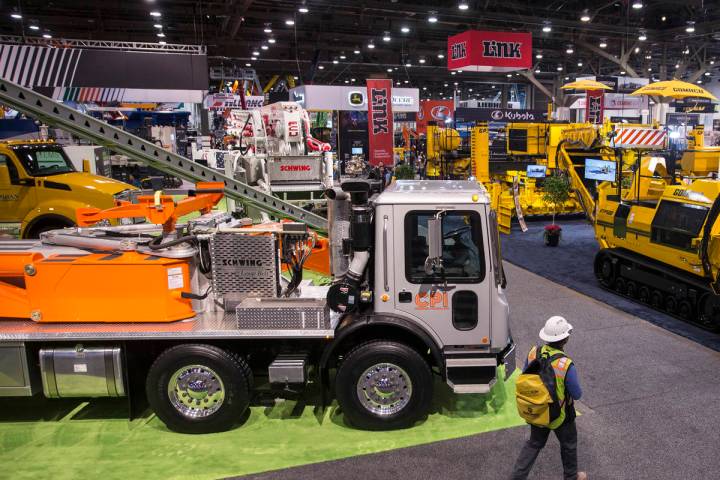 Convention goers explore the Central Hall during the last day of World of Concrete on Friday, J ...