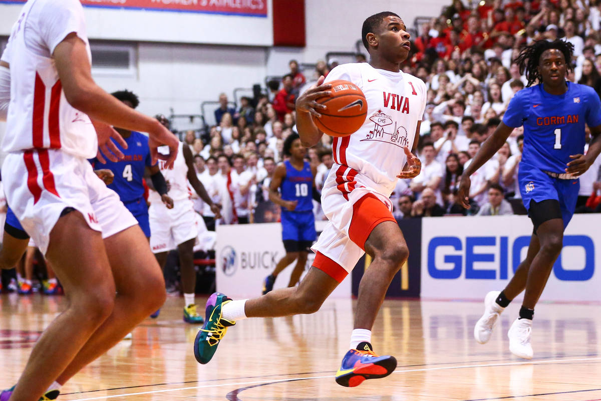 Coronado's Jaden Hardy (1) drives to the basket against Bishop Gorman's Will McClendon (1) duri ...