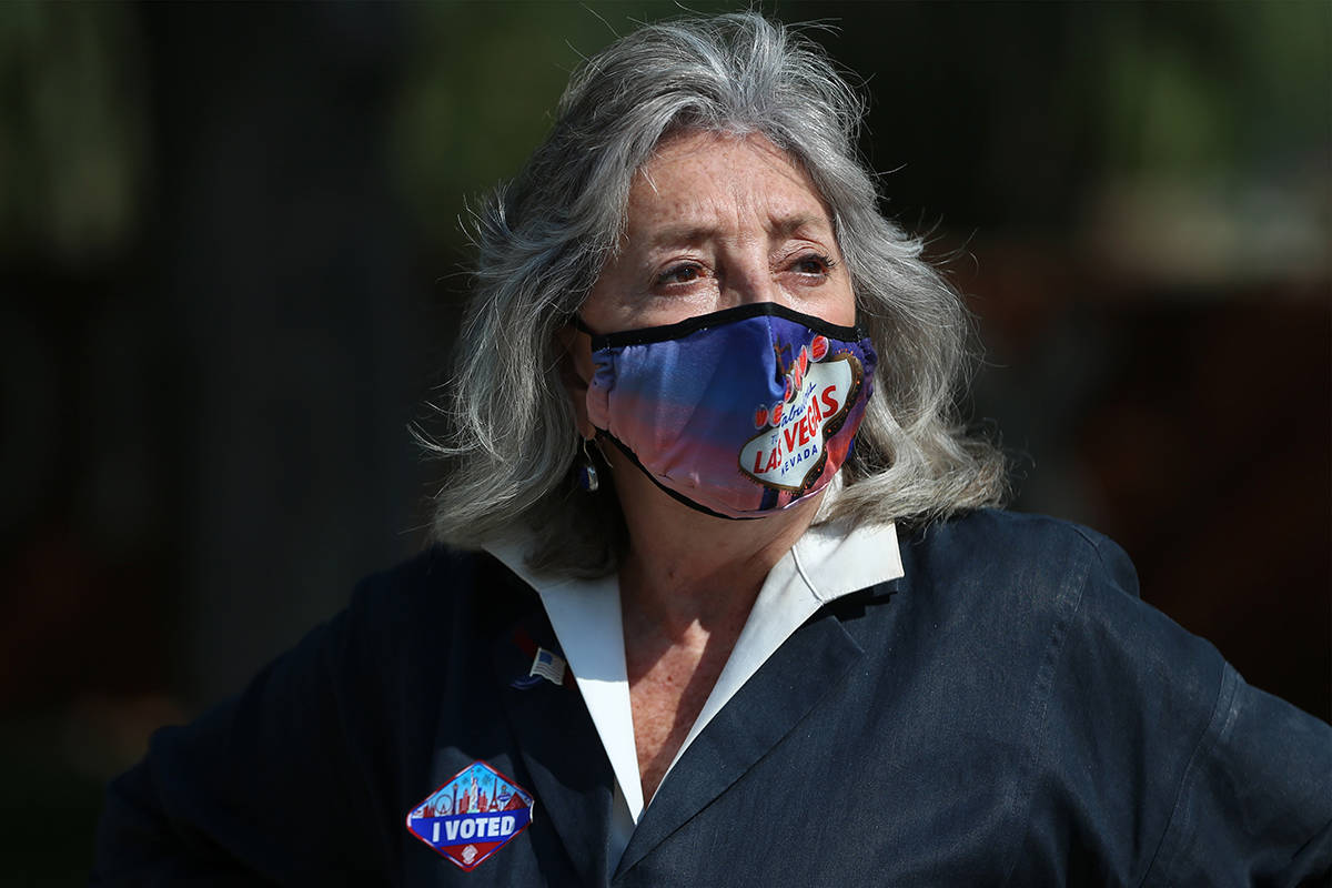 In this Oct. 21, 2020 file photo, U.S. Rep. Dina Titus, D-Nev., center, participates during an ...