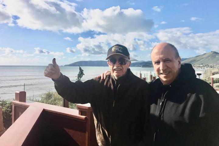 Retired Marine Peter "Chris" Christoff gives a thumbs up while on vacation with his longtime fr ...