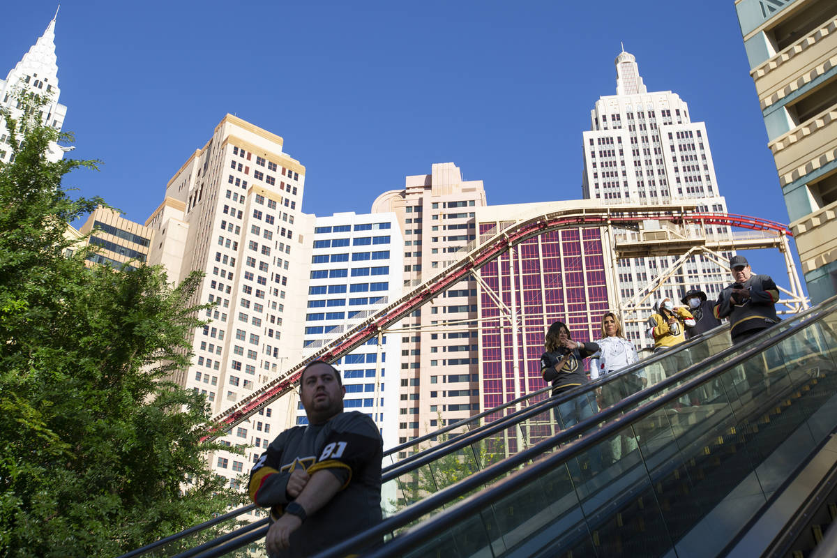 Golden Knights fans come to T-Mobile Arena from New York New York before an NHL playoff game be ...