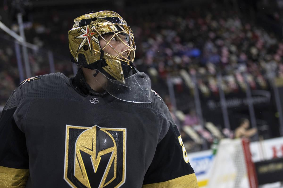 Golden Knights goaltender Marc-Andre Fleury (29) skates around the goal during the second perio ...