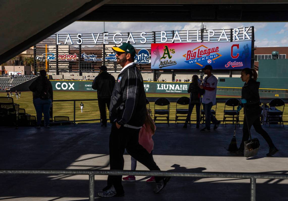 Fans stream about the stadium as the Cleveland Indians and Oakland Athletics play during a Big ...