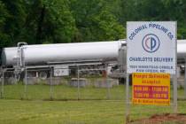Tanker trucks are parked near the entrance of Colonial Pipeline Company Wednesday, May 12, 2021 ...