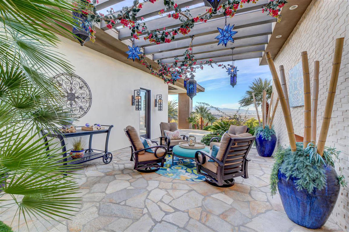 Patio opens to one of two pools. (Keller Williams)