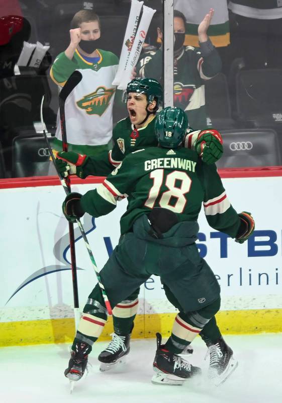 Minnesota Wild center Joel Eriksson Ek (14) and left wing Jordan Greenway (18) celebrate Erikss ...