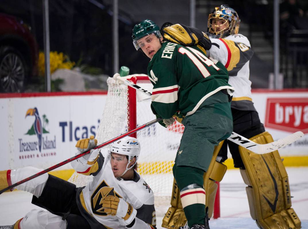 Vegas Golden Knights defenseman Zach Whitecloud (2) and goaltender Marc-Andre Fleury (29) team ...