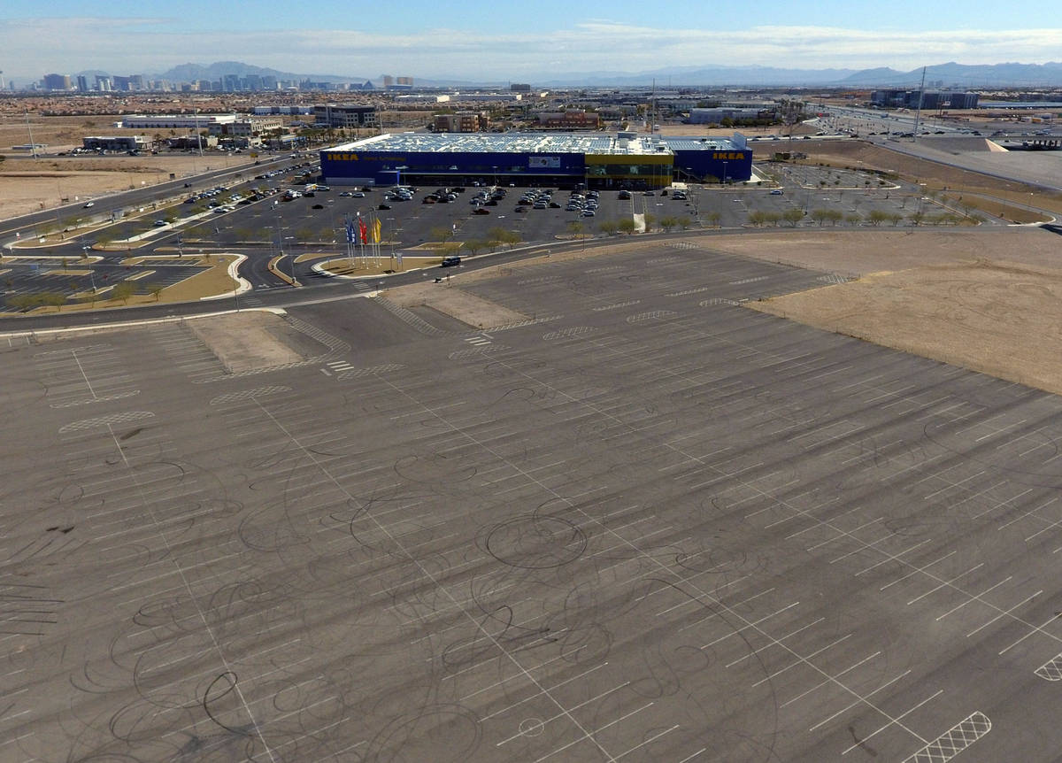 A swath of land where Ashley Furniture will set out to build a big store at Sunset Road just ea ...