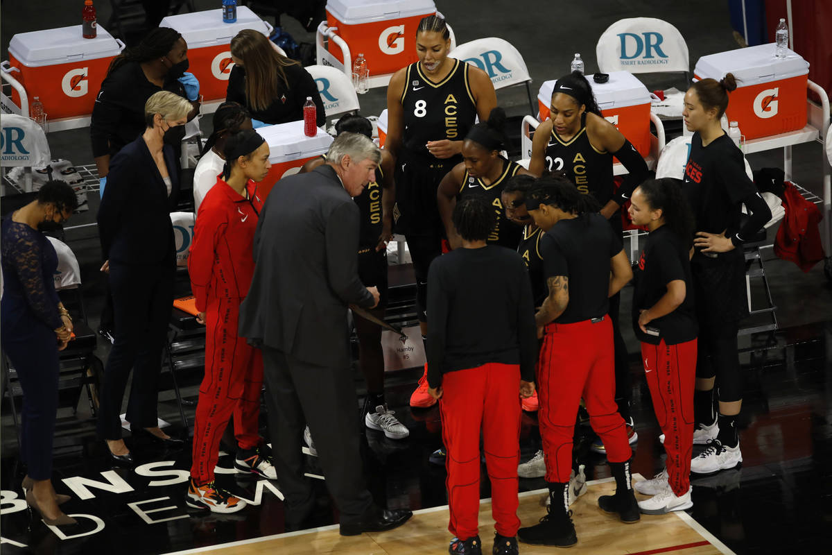 Las Vegas Aces players get together withLas Vegas Aces head coach Bill Laimbeer, center, before ...