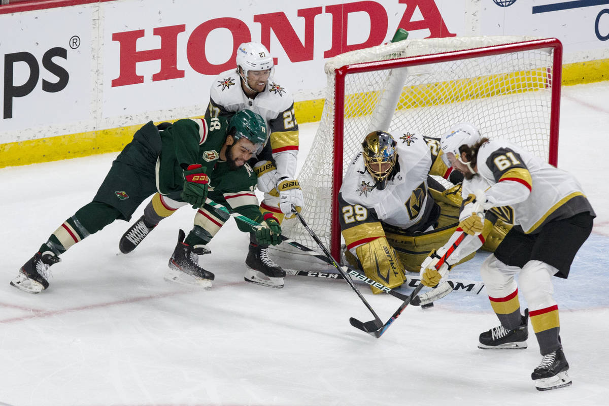 Minnesota Wild left wing Jordan Greenway (18) shoots against Vegas Golden Knights goaltender Ma ...