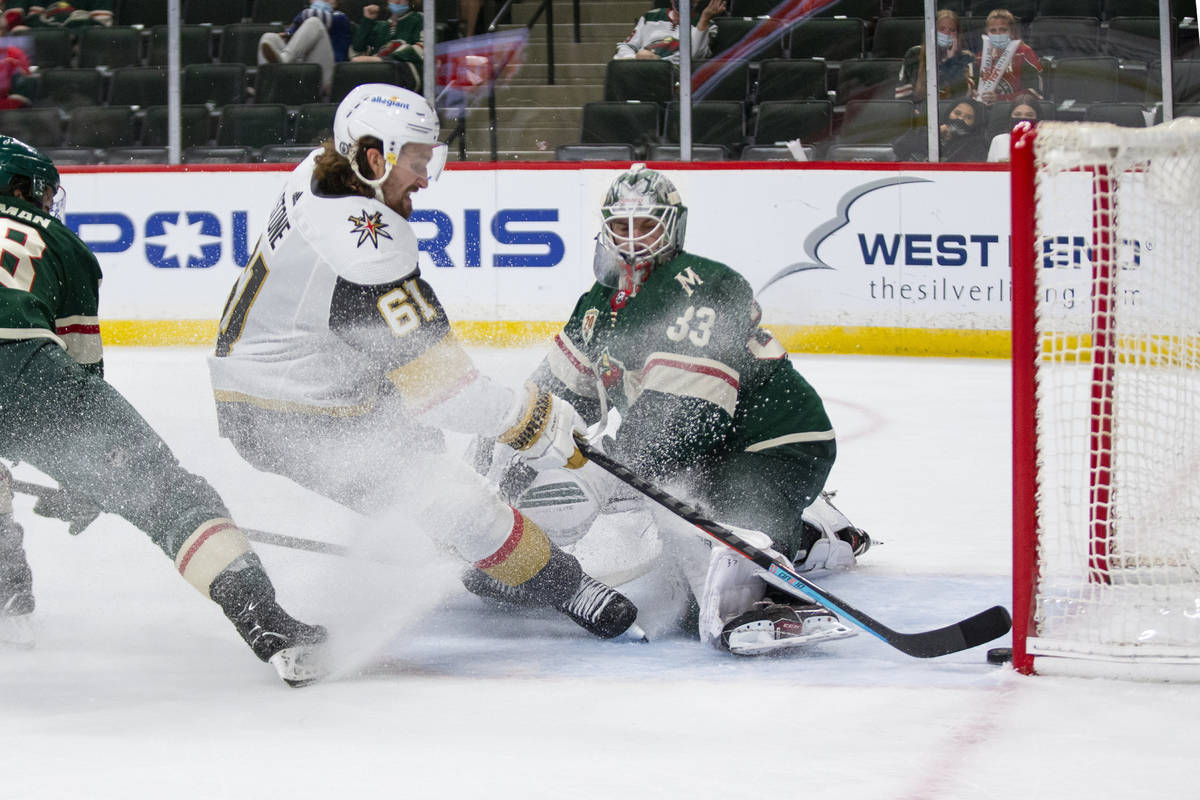 Vegas Golden Knights right wing Mark Stone (61) scores a goal against Minnesota Wild goaltender ...