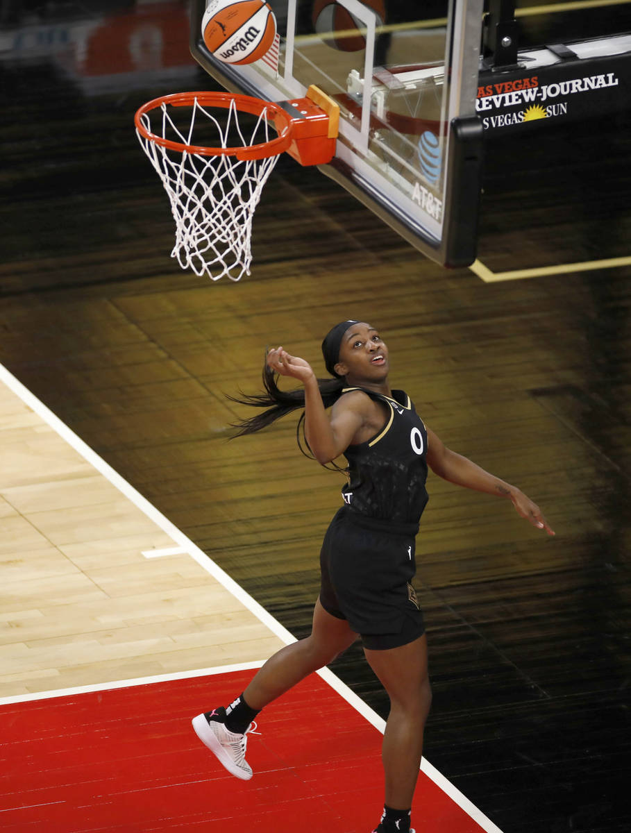 Las Vegas Aces guard Jackie Young (0) shoots during the first quarter of a WNBA basketball game ...