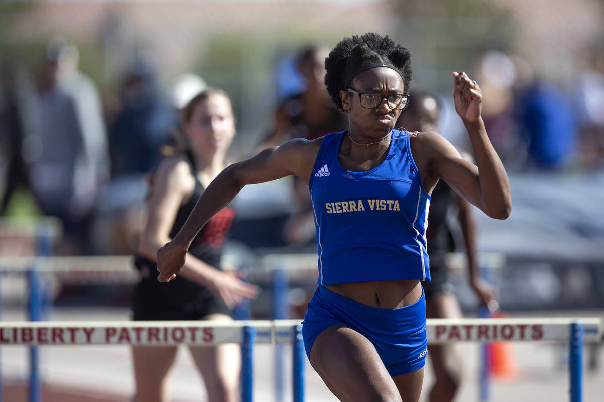 Sierra Vista's Ajanae Cressey, second from left, competes in the girls 100 hurdles final race d ...