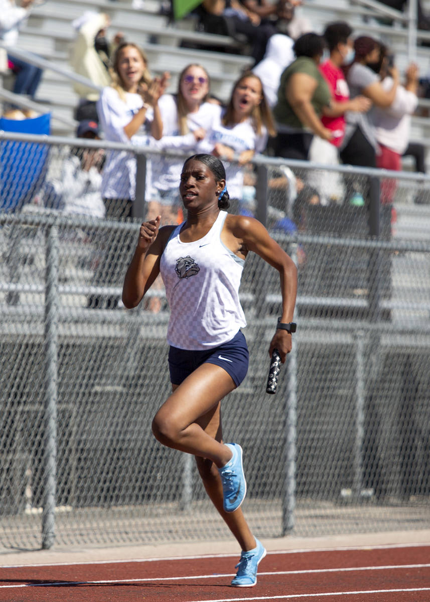 Centennial's Iyonna Codd competes in the girls 4x200 meter relay race during the class 5A South ...